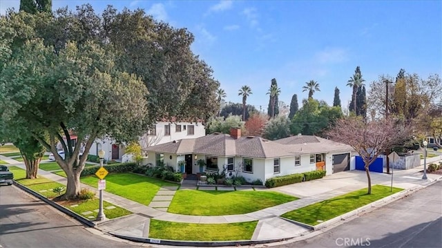 ranch-style home with a front yard