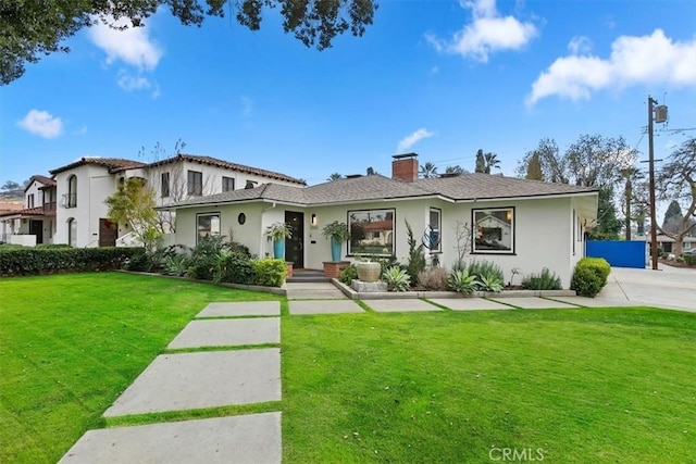 view of front of house with a front yard