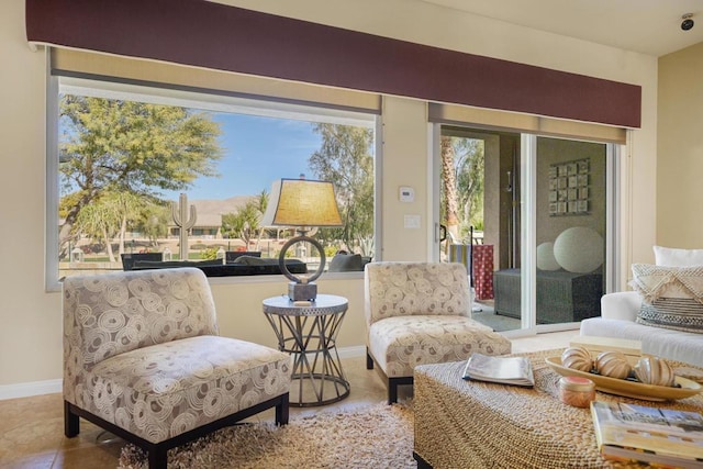 living area featuring tile patterned floors