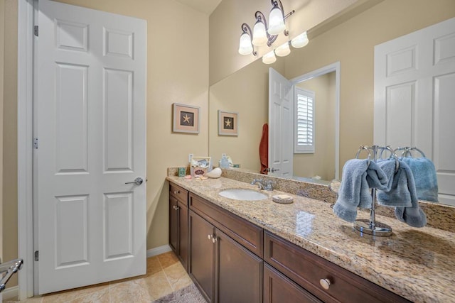 bathroom featuring vanity and tile patterned flooring