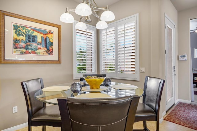 dining room featuring an inviting chandelier