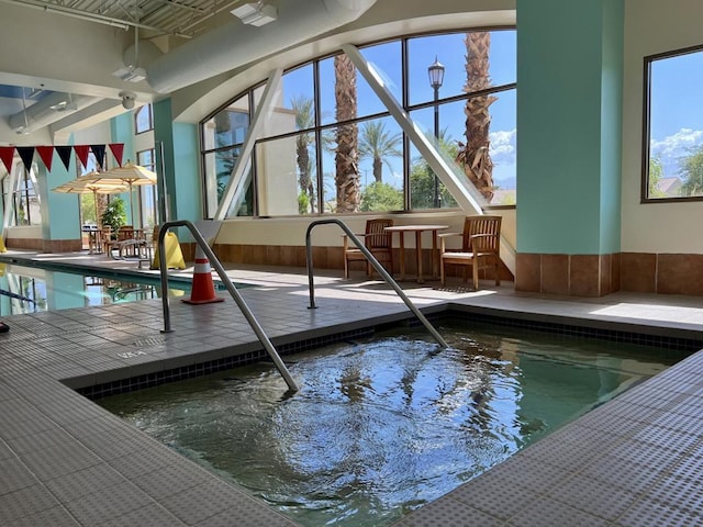 view of pool featuring an indoor in ground hot tub