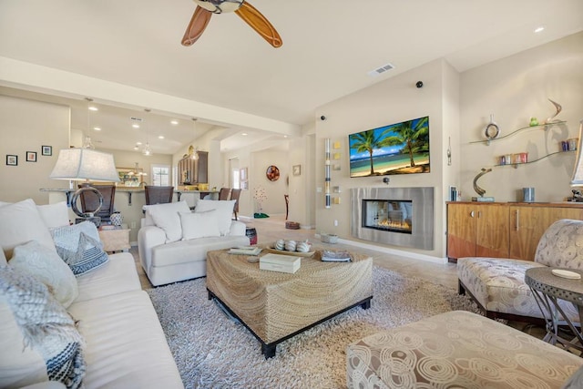 living room featuring ceiling fan