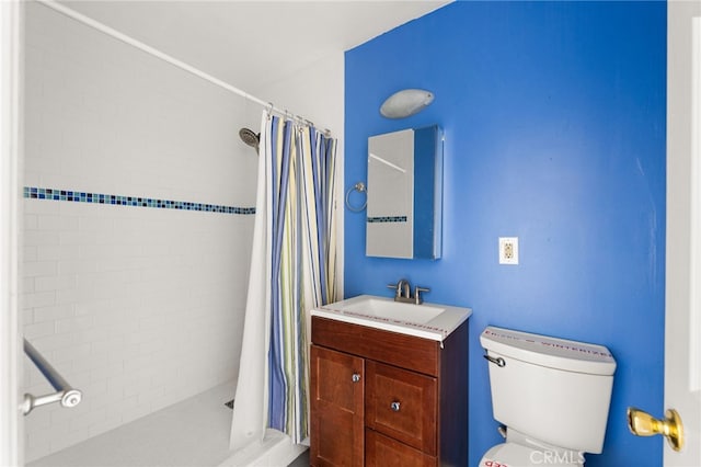 full bath with toilet, a shower stall, and vanity