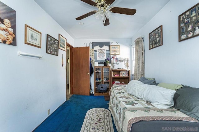 bedroom featuring ceiling fan and carpet flooring