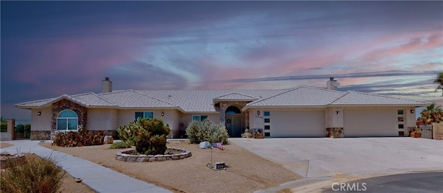 single story home featuring a garage