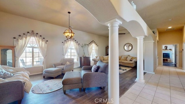 tiled living room with decorative columns