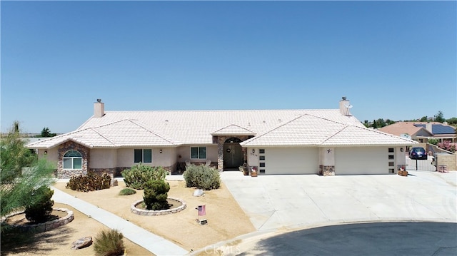 ranch-style house featuring a garage