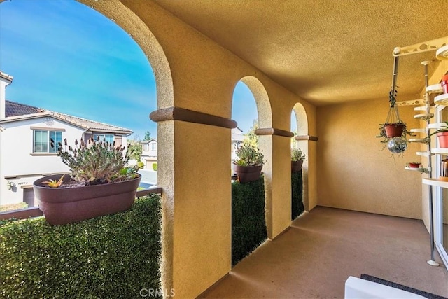 view of patio / terrace featuring a balcony