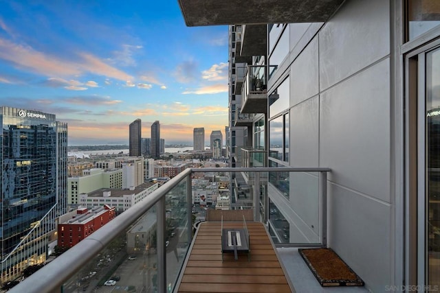 view of balcony at dusk