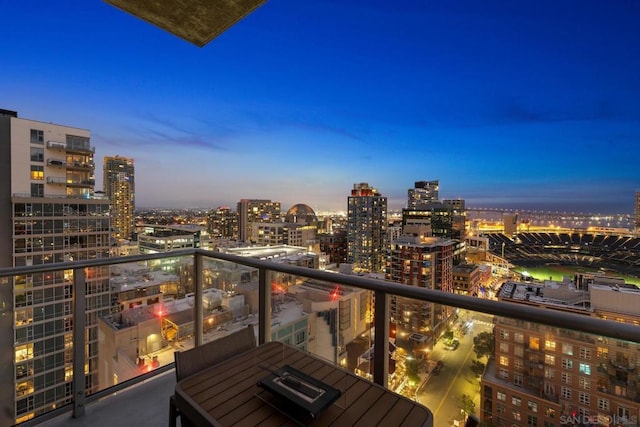 view of balcony at dusk