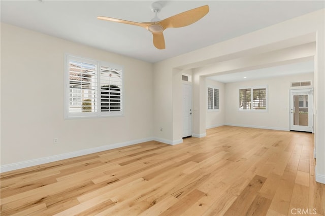 unfurnished room featuring ceiling fan and light hardwood / wood-style flooring