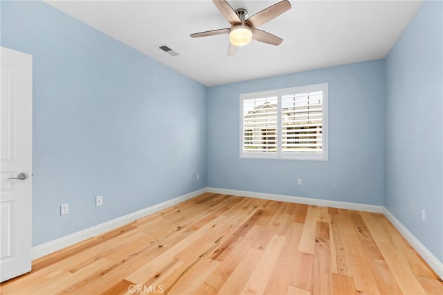 unfurnished room featuring ceiling fan and light hardwood / wood-style floors