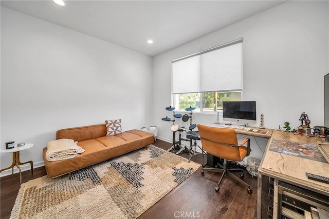 home office with dark wood-type flooring