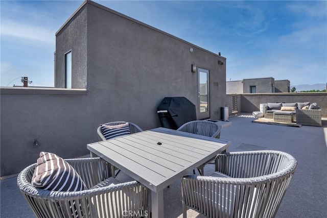 view of patio featuring area for grilling and outdoor lounge area