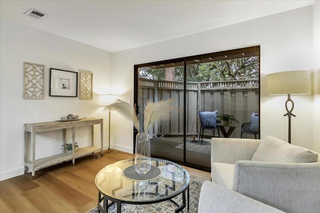 living area featuring hardwood / wood-style floors