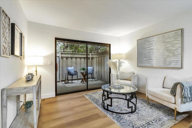 living area featuring hardwood / wood-style floors