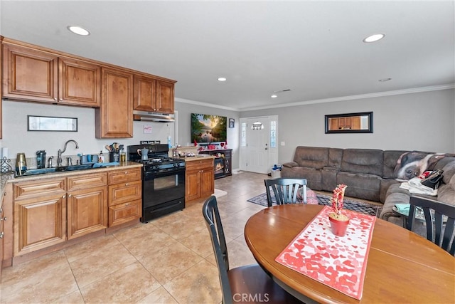 kitchen featuring crown molding, black range with gas stovetop, sink, and light tile patterned floors