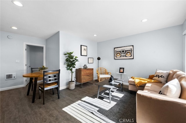 living room featuring dark wood-type flooring