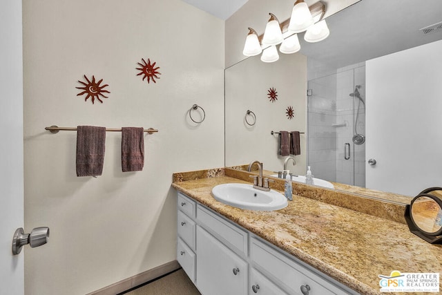 bathroom with vanity and walk in shower