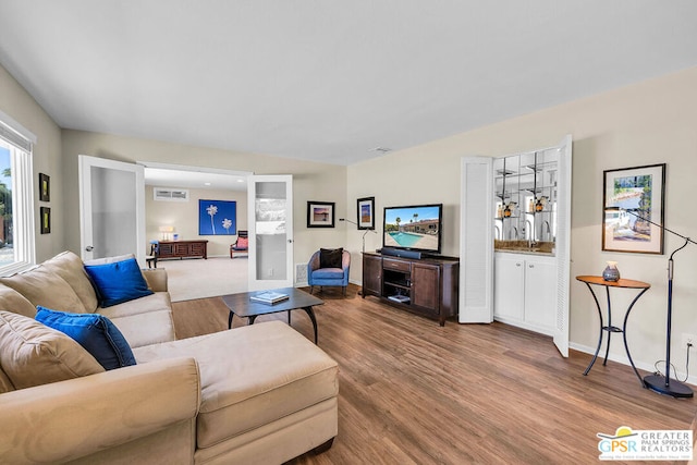 living room featuring wood-type flooring