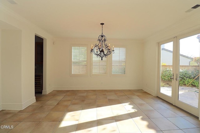 unfurnished dining area featuring crown molding, plenty of natural light, and light tile patterned flooring