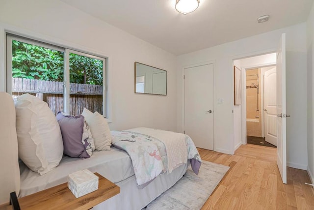 bedroom featuring light wood-type flooring