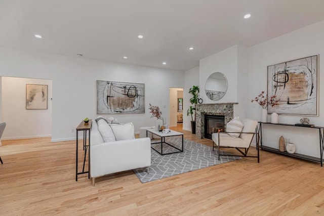 living room with light hardwood / wood-style flooring