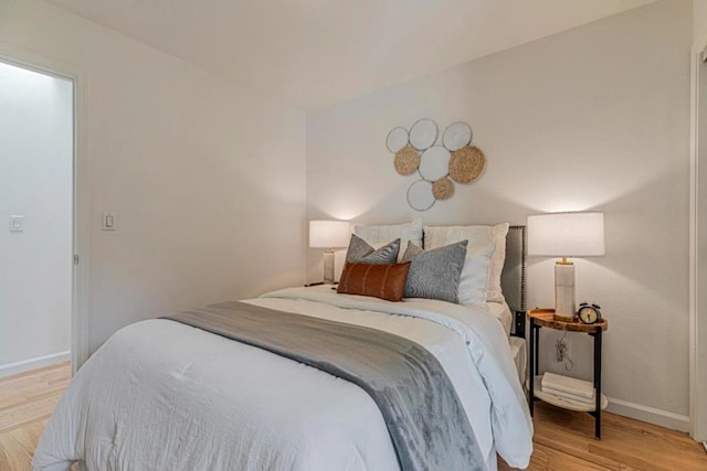 bedroom featuring light hardwood / wood-style flooring