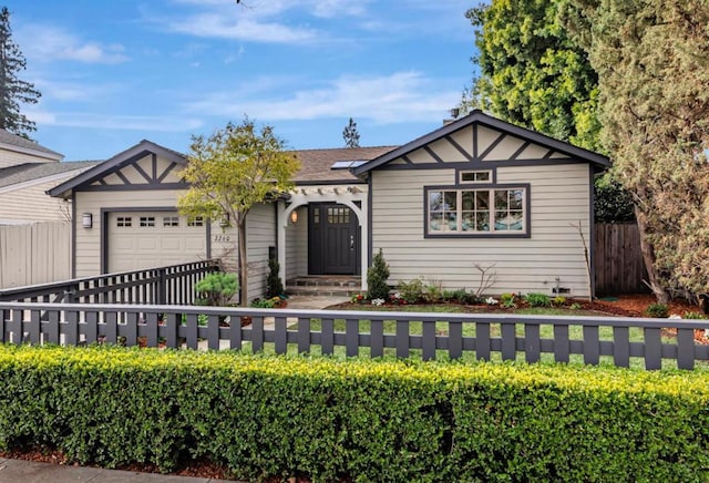 view of front of property featuring a garage