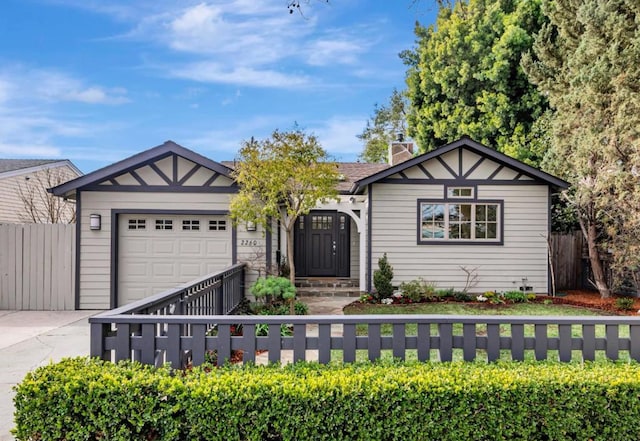 view of front of property with a garage