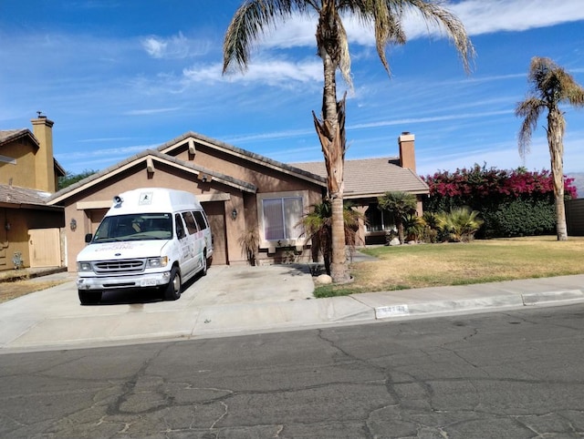 view of front facade featuring a front yard