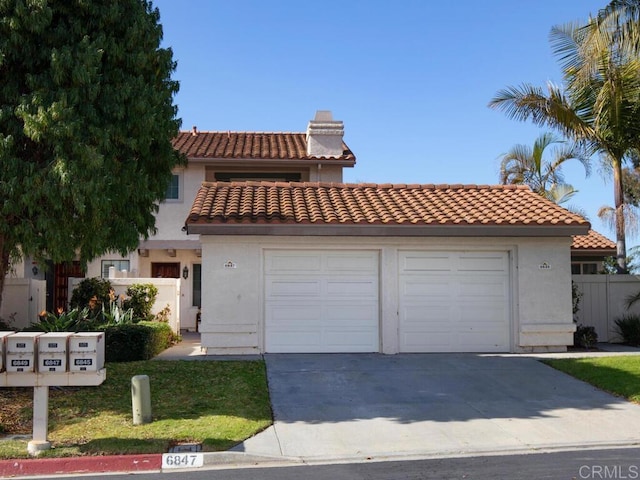 view of front of property featuring a garage