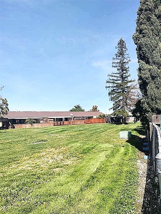 view of yard featuring fence