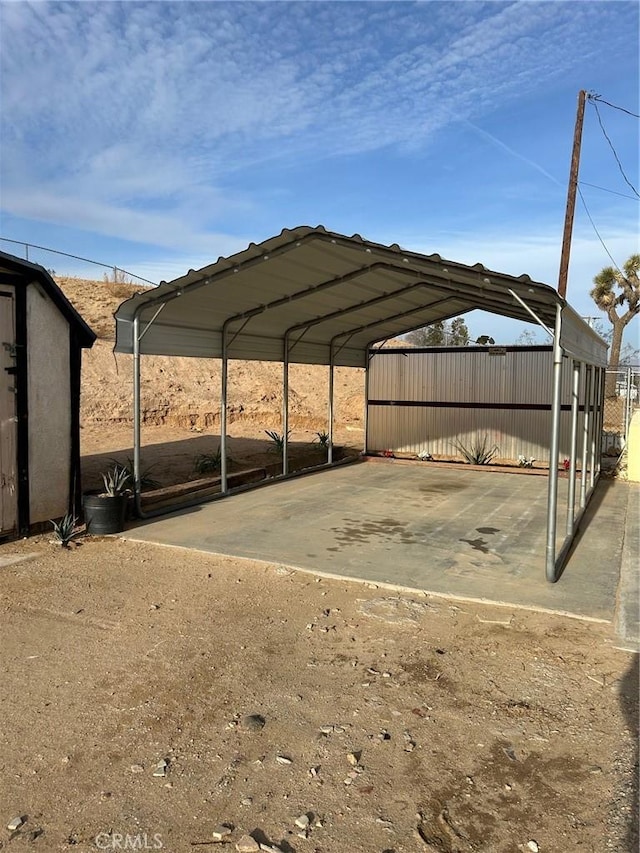 view of car parking with a detached carport