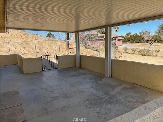 view of patio / terrace featuring fence