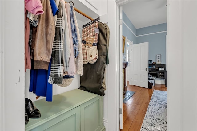 mudroom with light hardwood / wood-style floors