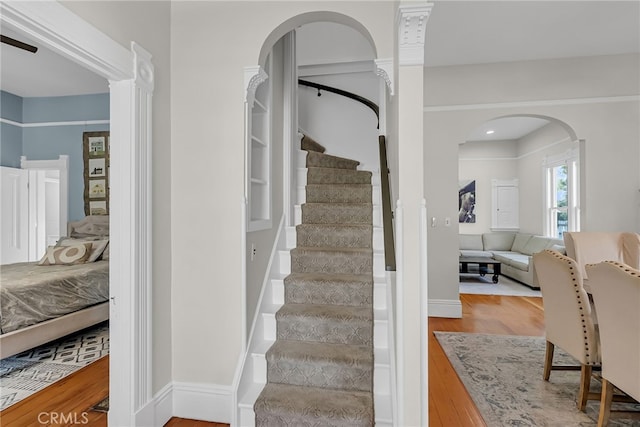 stairway with wood-type flooring