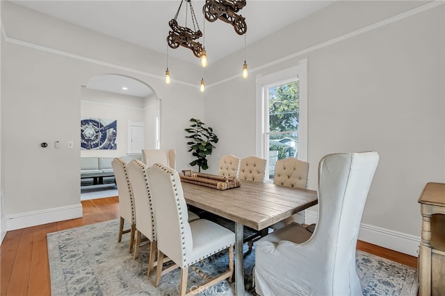 dining space featuring hardwood / wood-style flooring