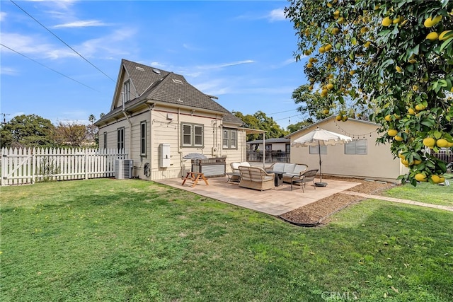 rear view of house with an outdoor hangout area, a patio area, a lawn, and central air condition unit