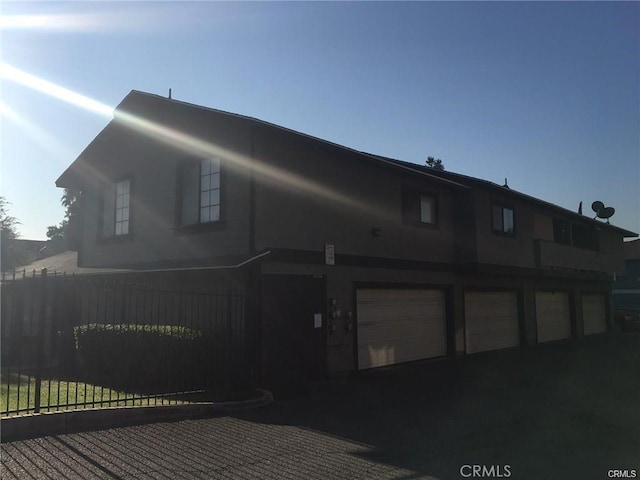 view of front of home with a garage