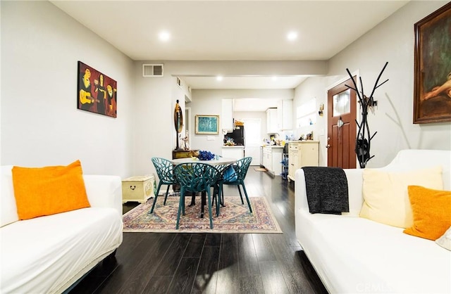 living room with wood-type flooring