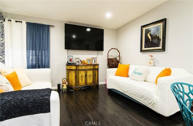 bedroom with dark hardwood / wood-style floors