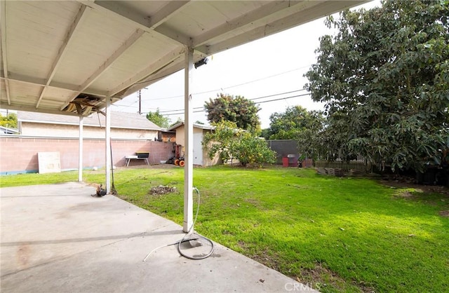 view of yard with a patio area