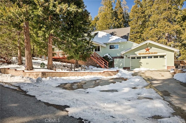 view of front of property with a garage