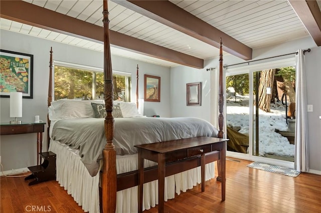 bedroom with access to exterior, beam ceiling, wood ceiling, wood finished floors, and baseboards