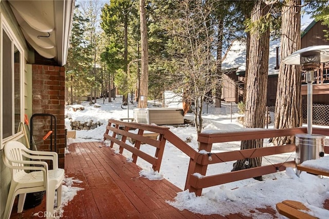 view of snow covered deck