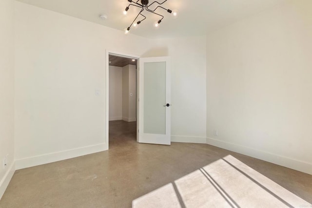 unfurnished bedroom featuring concrete flooring