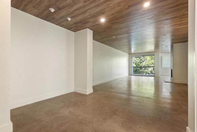 unfurnished room featuring wood ceiling