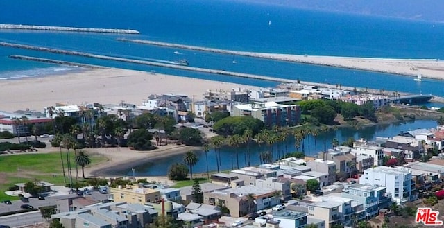 aerial view featuring a water view and a view of the beach